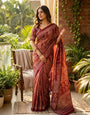 Ethnic Maroon Ajrakh Printed Mirror Work Satin Silk Saree With Intricate Blouse Piece