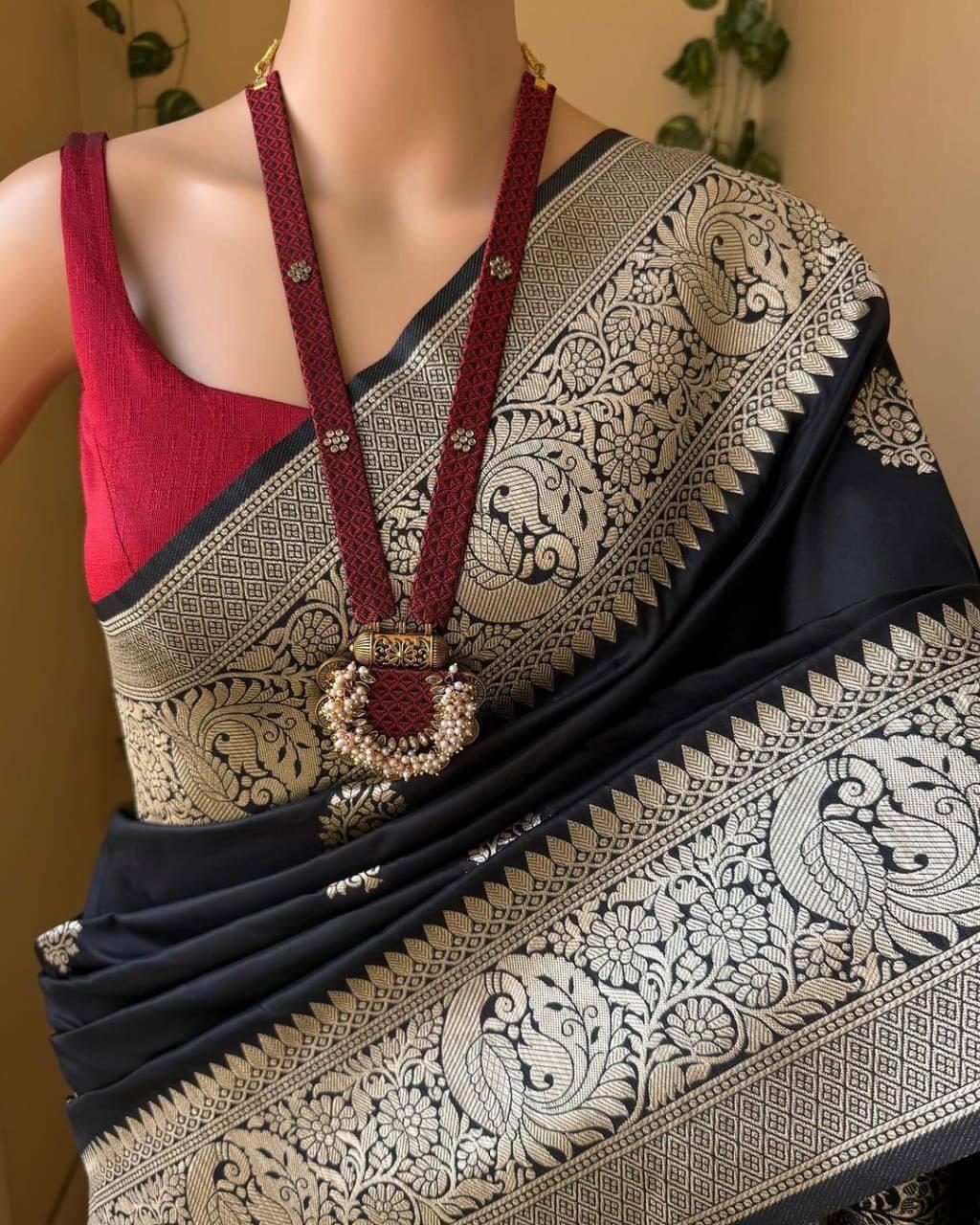 Scintillating Black Soft Silk Saree With Exquisite Blouse Piece