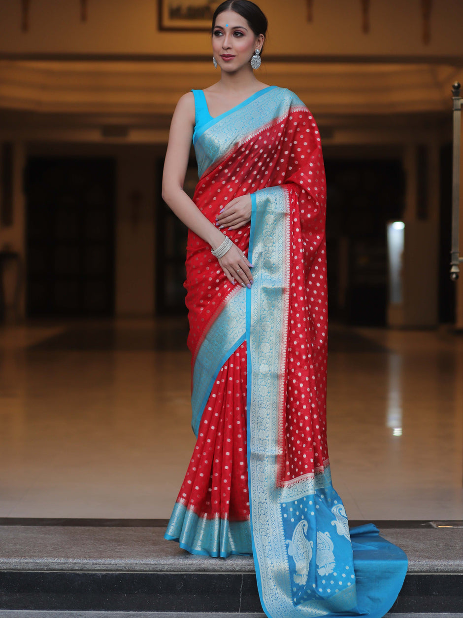 Pleasant Red Soft Silk Saree With Desiring Blouse Piece