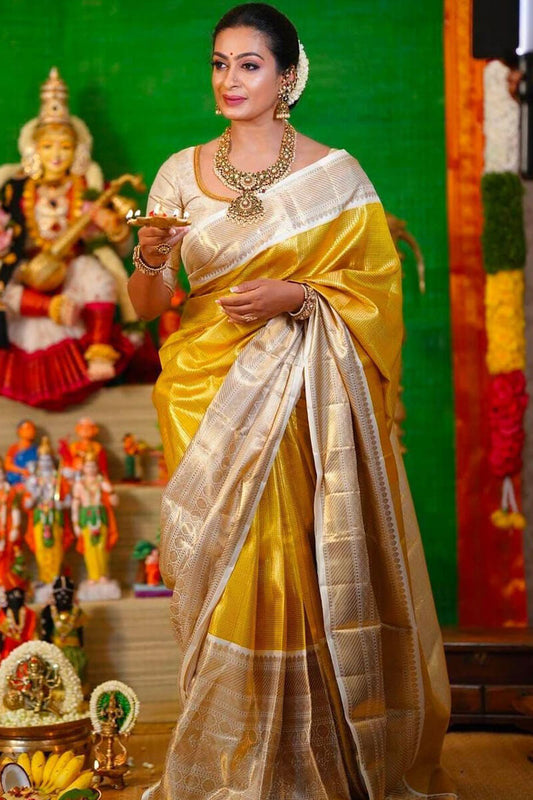 Innovative Yellow Kanjivaram Silk Saree With Phenomenal Blouse Piece