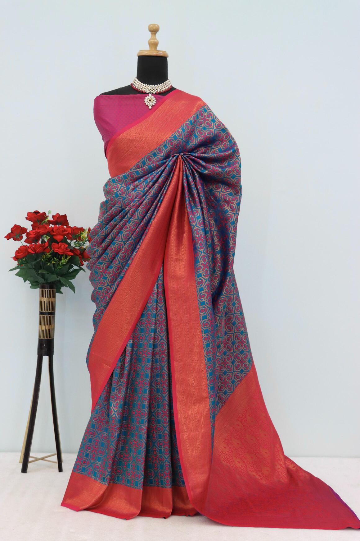 Blooming Navy Blue Soft Banarasi Silk Saree With Opulent Blouse Piece