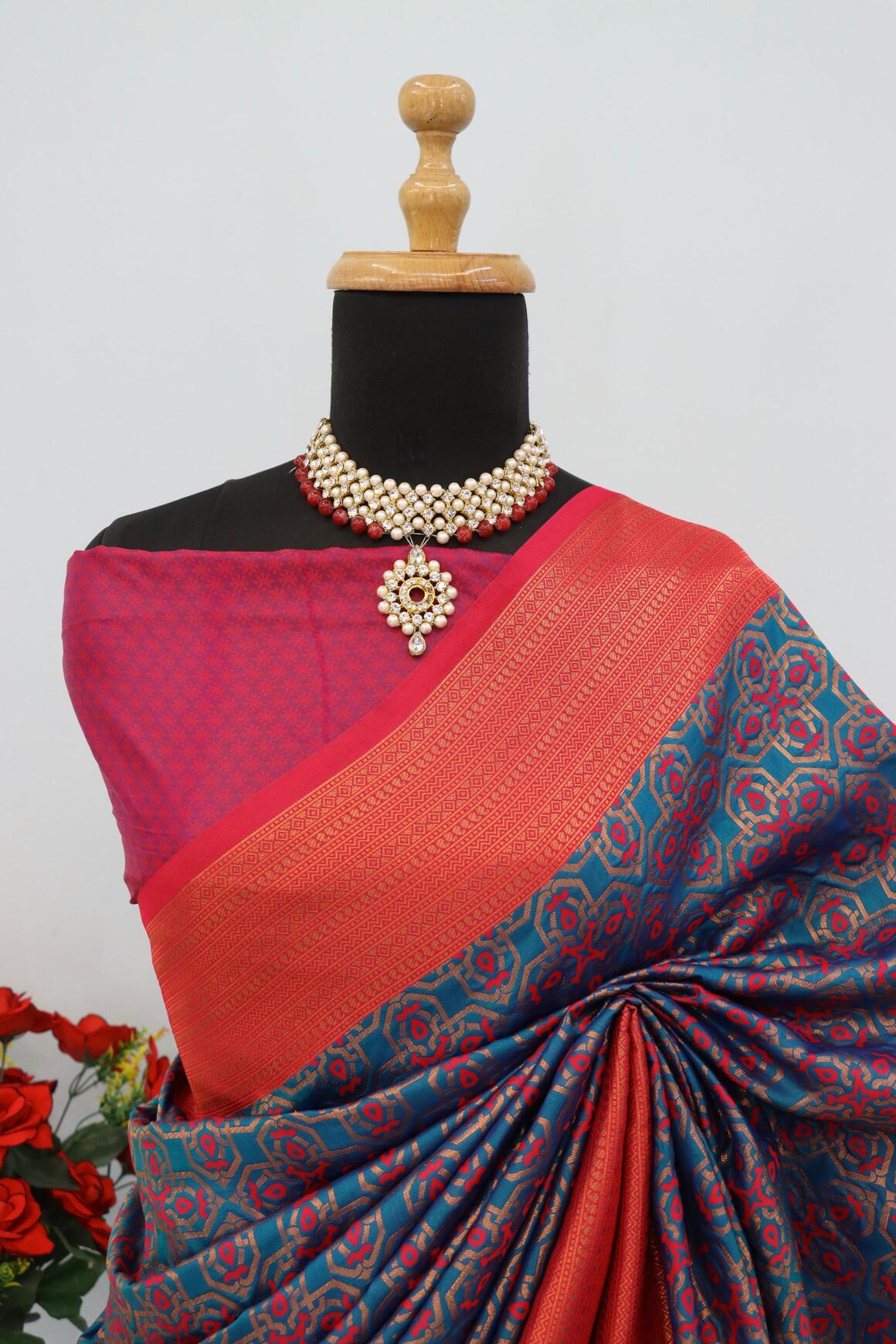 Blooming Navy Blue Soft Banarasi Silk Saree With Opulent Blouse Piece