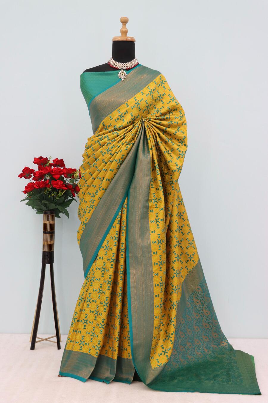 Demanding Yellow Soft Banarasi Silk Saree With Intricate Blouse Piece