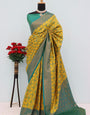 Demanding Yellow Soft Banarasi Silk Saree With Intricate Blouse Piece