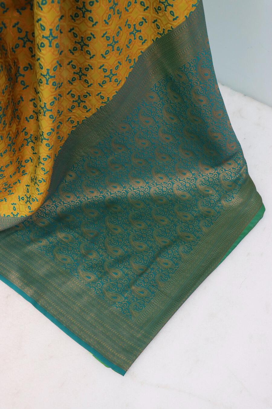 Demanding Yellow Soft Banarasi Silk Saree With Intricate Blouse Piece