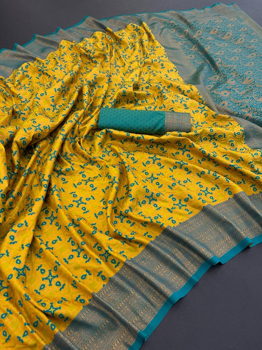 Demanding Yellow Soft Banarasi Silk Saree With Intricate Blouse Piece