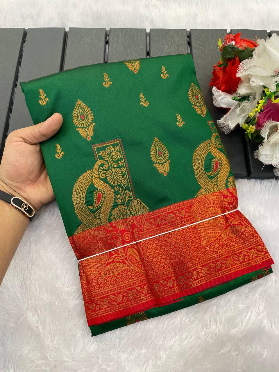 Evanescent Dark Green Soft Banarasi Silk Saree With Lissome Blouse Piece