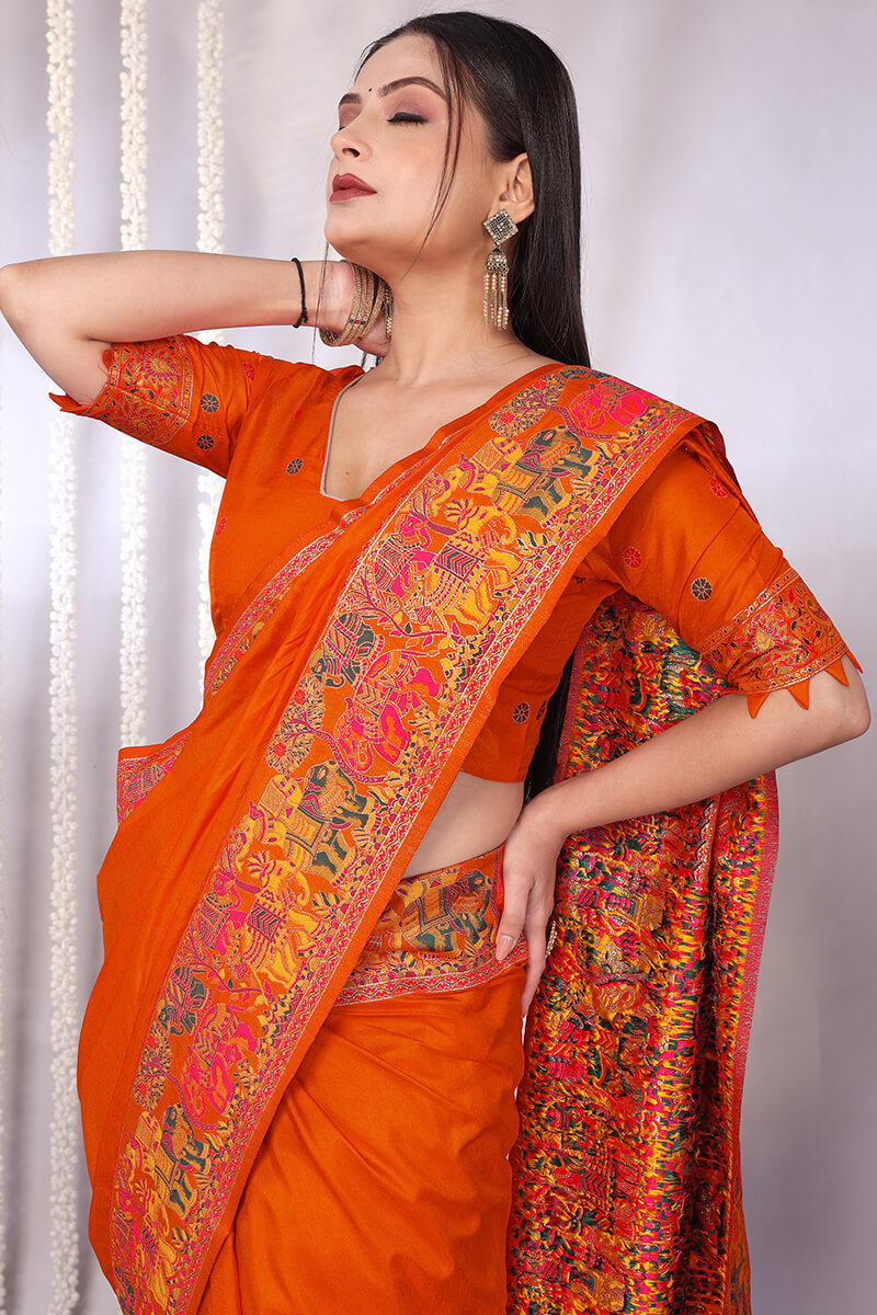 Charismatic Orange Pashmina Saree With Gossamer Blouse Piece