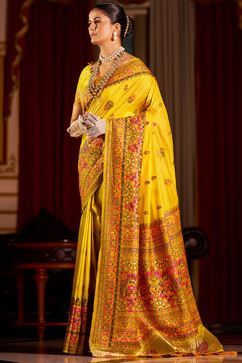 Cynosure Yellow Pashmina Saree With Sonorous Blouse Piece