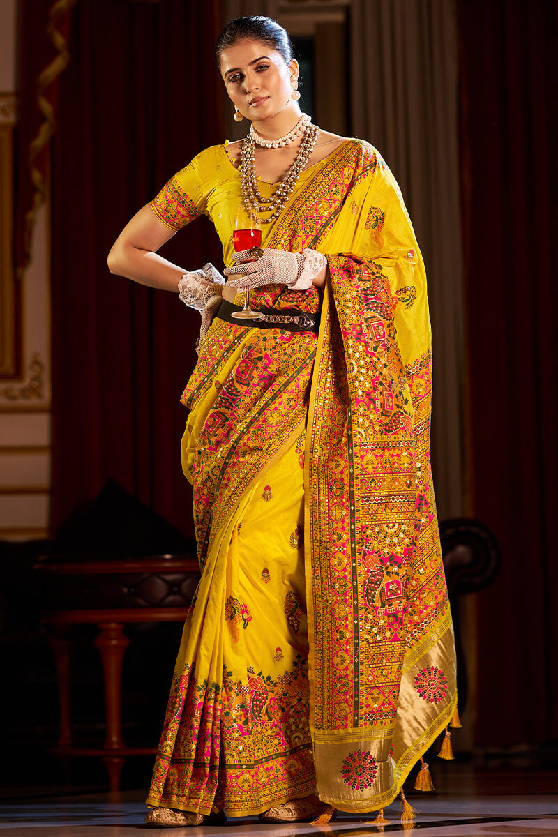 Cynosure Yellow Pashmina Saree With Sonorous Blouse Piece