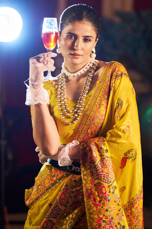 Cynosure Yellow Pashmina Saree With Sonorous Blouse Piece