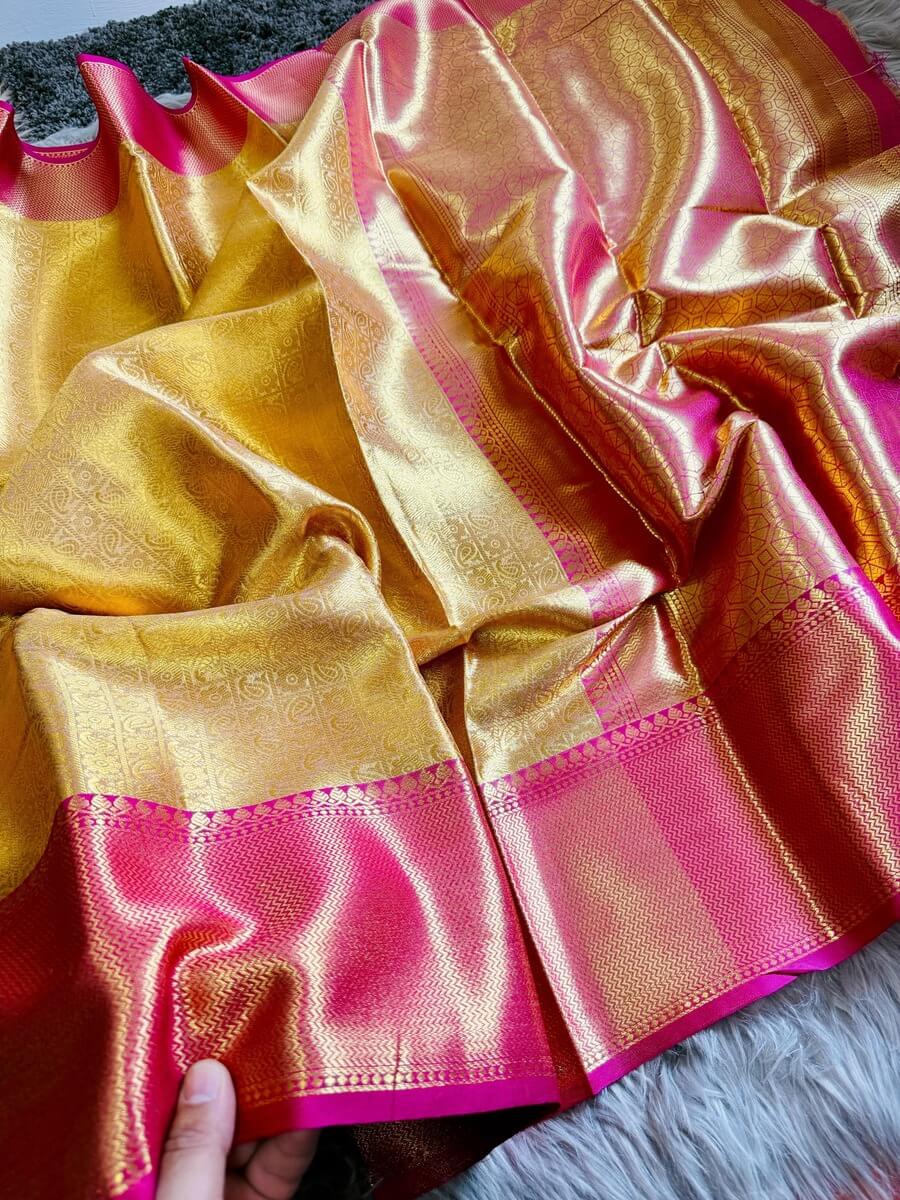 Bollywood Style Golden Soft Tissue Silk Saree With Entrancing Blouse Piece