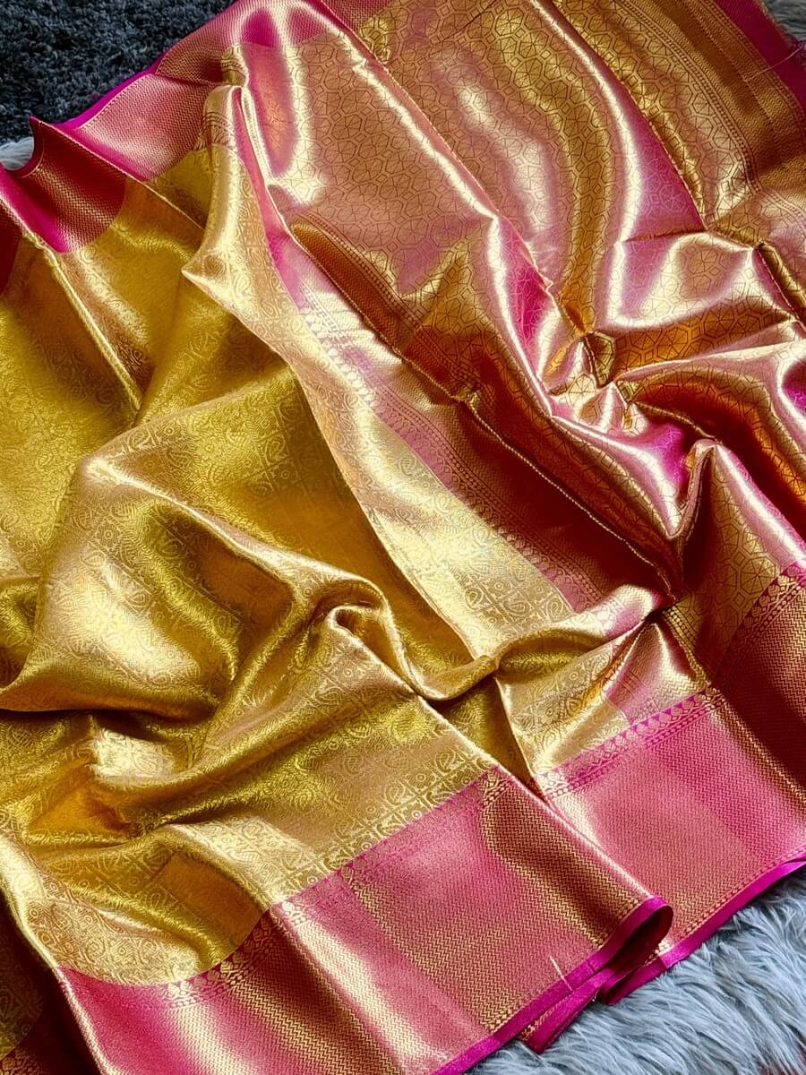 Bollywood Style Golden Soft Tissue Silk Saree With Entrancing Blouse Piece