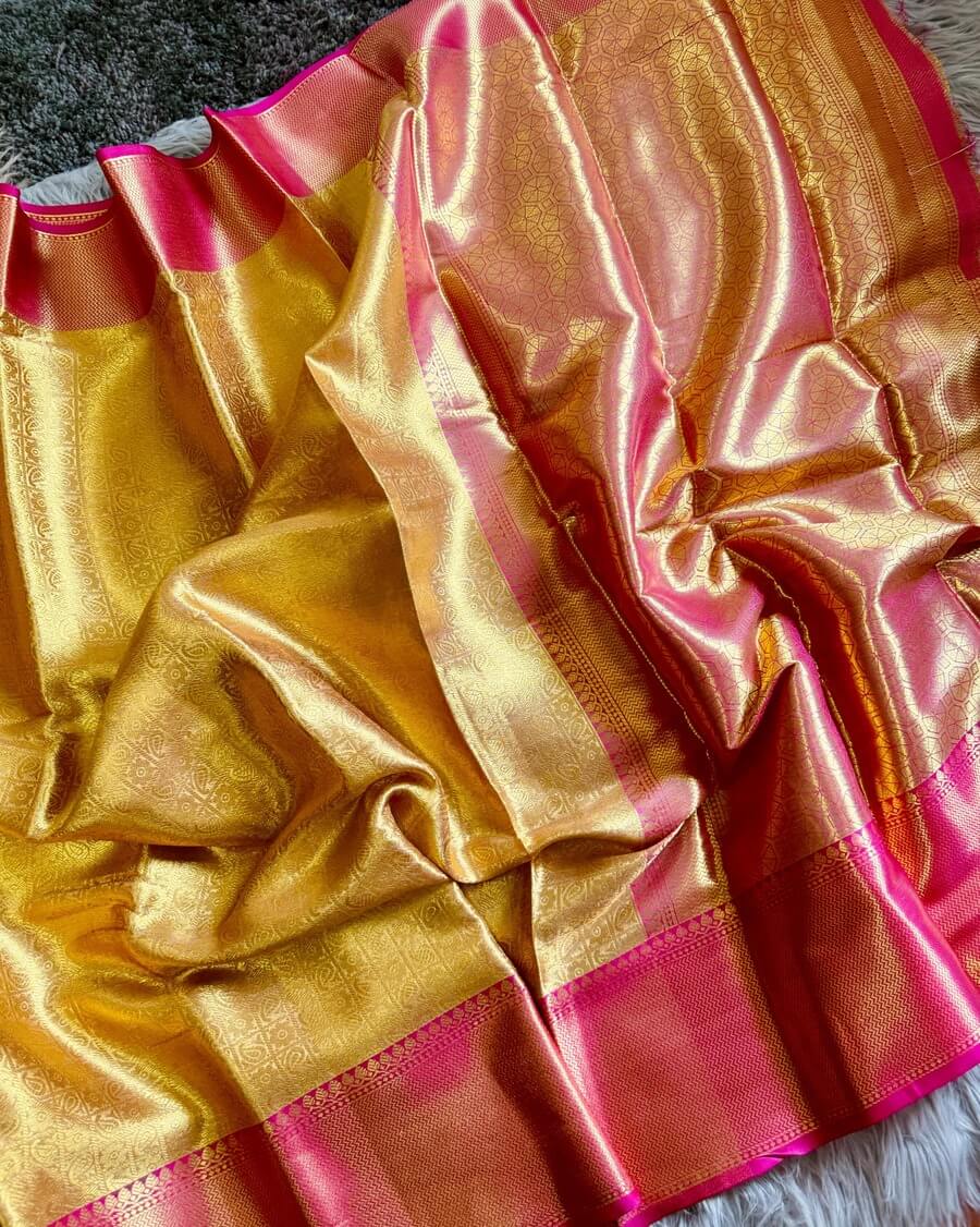 Bollywood Style Golden Soft Tissue Silk Saree With Entrancing Blouse Piece