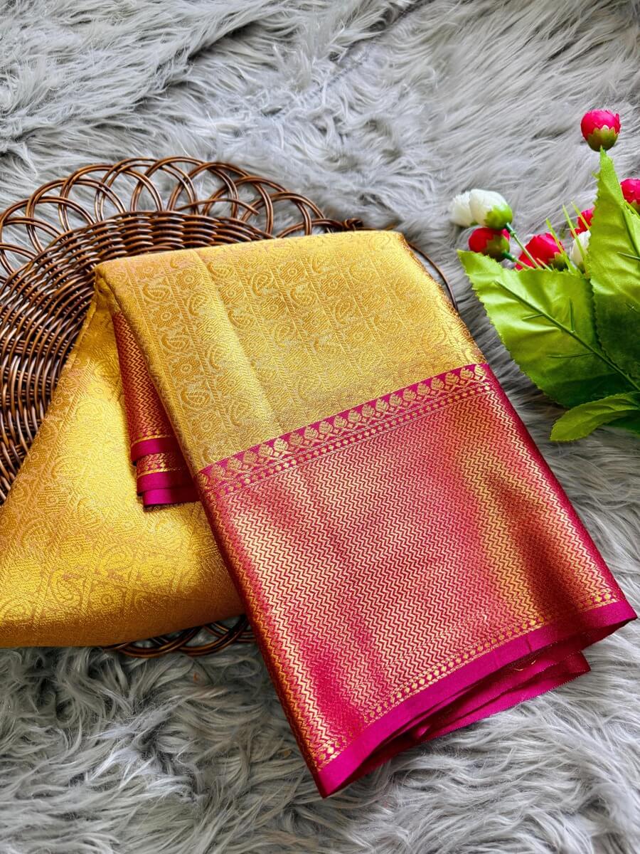 Bollywood Style Golden Soft Tissue Silk Saree With Entrancing Blouse Piece