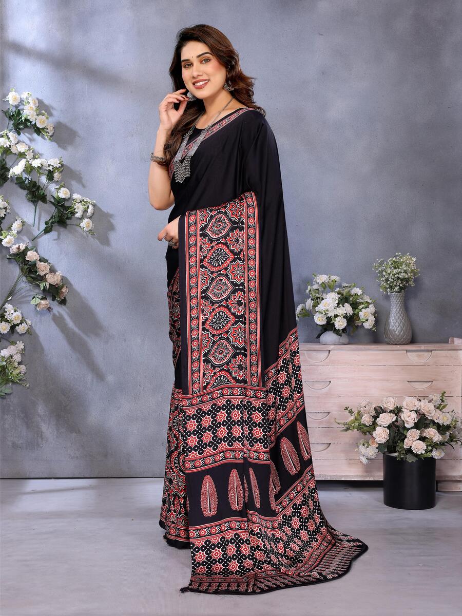 Groovy Black Ajrak Printed Soft Silk Saree With Amiable Blouse Piece