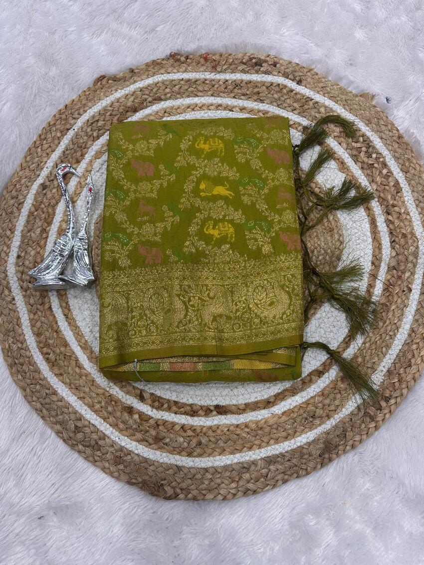 Magnetic Green Soft Banarasi Silk Saree With Twirling Blouse Piece