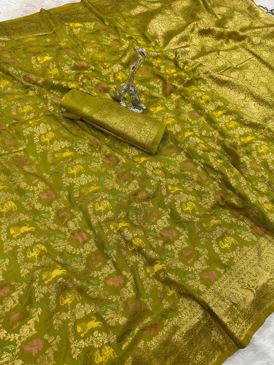 Magnetic Green Soft Banarasi Silk Saree With Twirling Blouse Piece