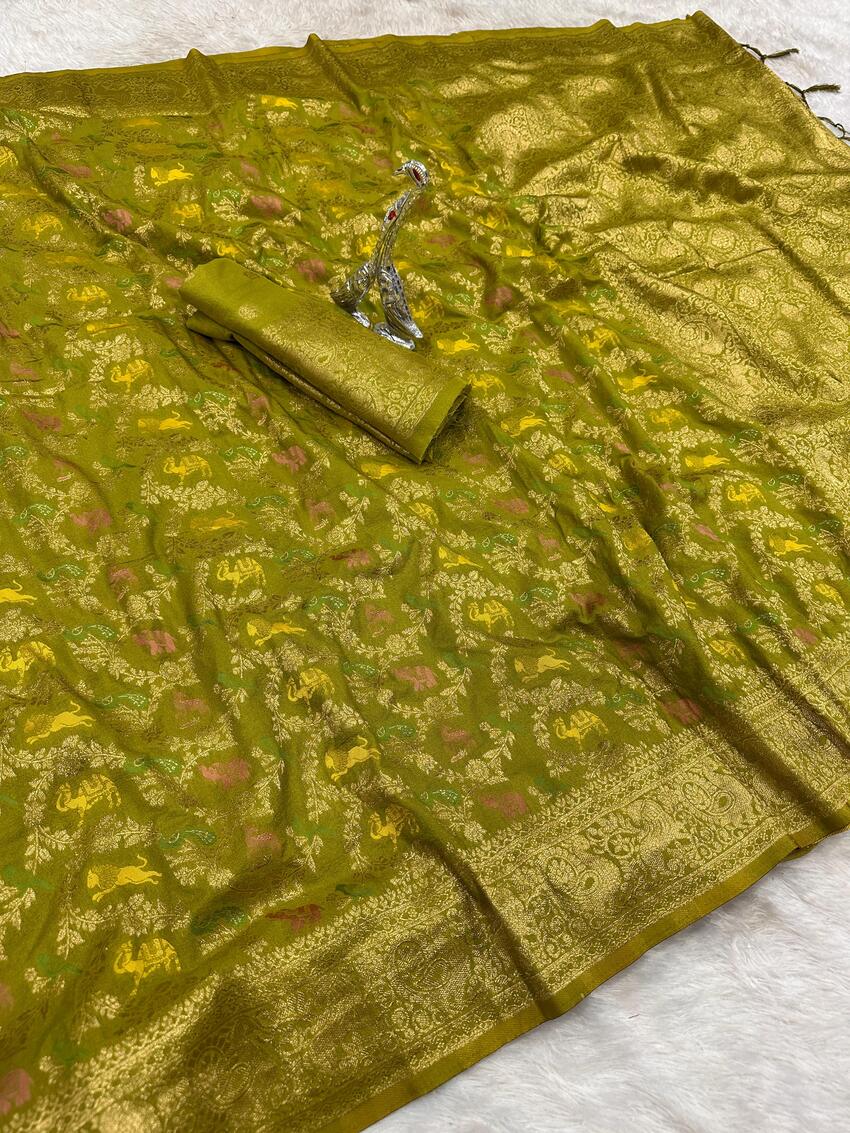 Magnetic Green Soft Banarasi Silk Saree With Twirling Blouse Piece