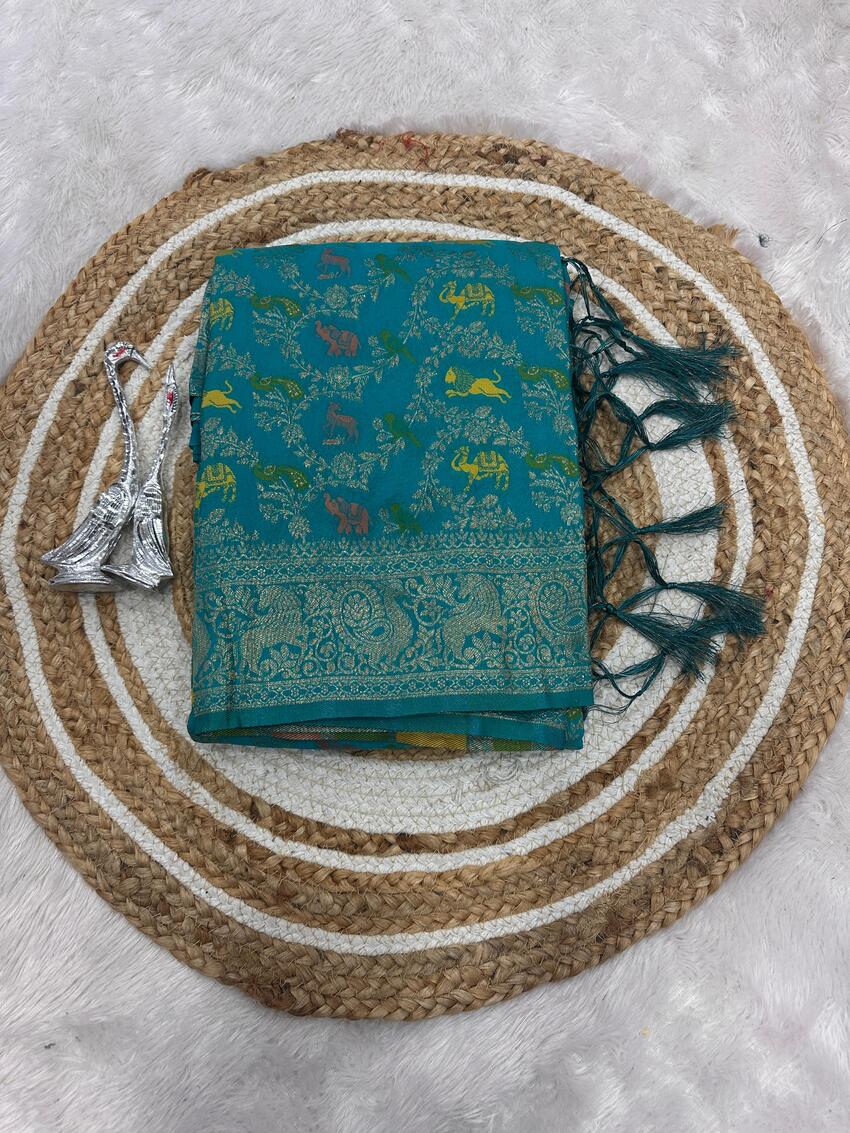 Incomparable Sea Green Soft Banarasi Silk Saree With Flaunt Blouse Piece
