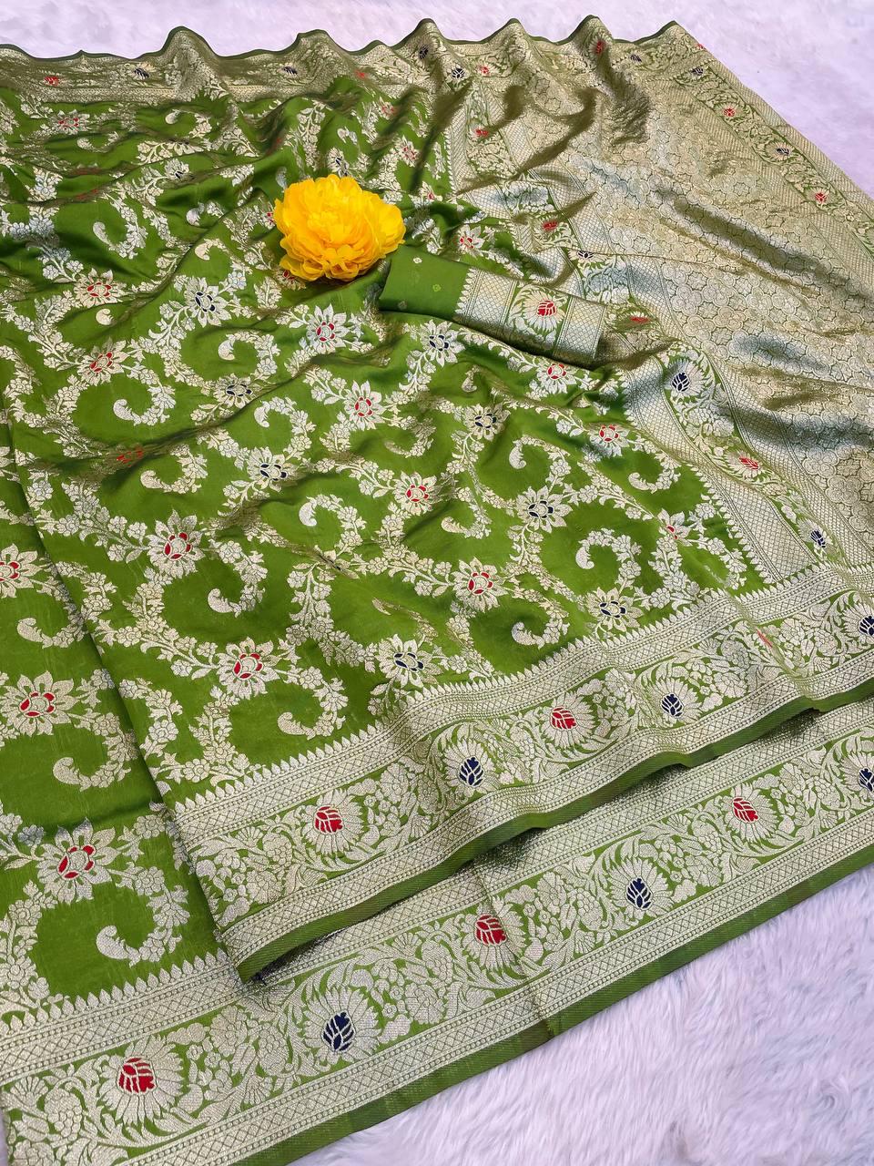 Cynosure Green Soft Banarasi Silk Saree With Stunner Blouse Piece