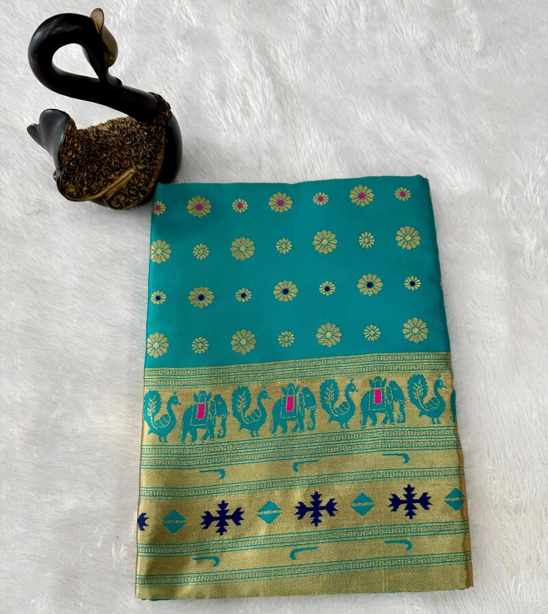 Eclat Turquoise Paithani Silk Saree With Flameboyant Blouse Piece