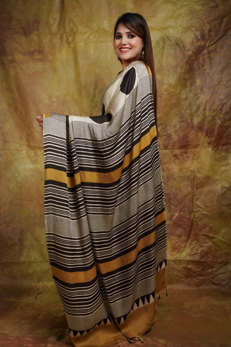 Embrocation Beige Digital Printed Crape Silk Saree With Super extravagant Blouse Piece