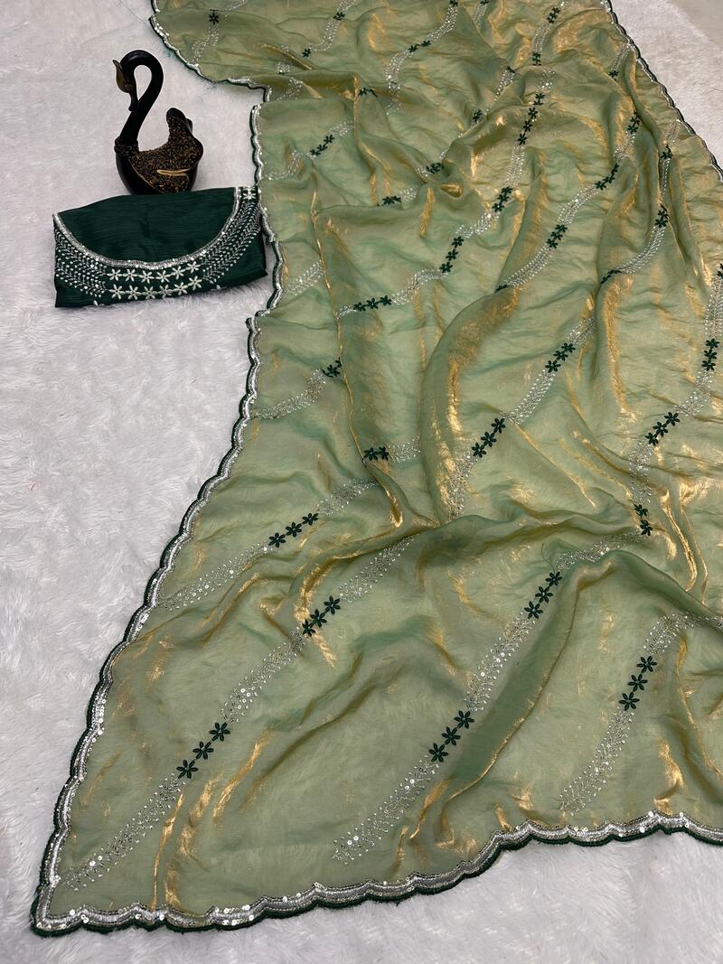 Elaborate Green Sequence Work Fandy Silk Saree With Gleaming Blouse Piece