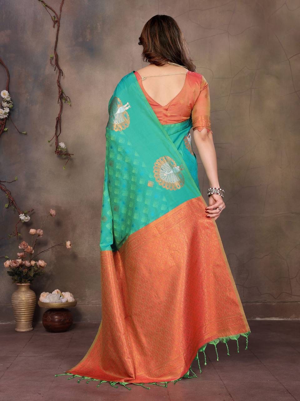 Susurrous Sea Green Soft Banarasi Silk Saree With Grandiose Blouse Piece