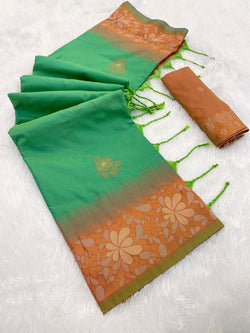 Desiring Green Soft Banarasi Silk Saree With Zephyr Blouse Piece