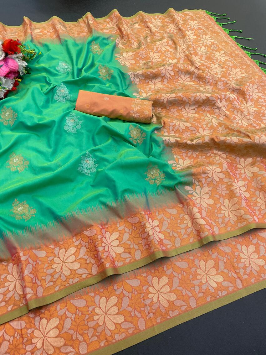 Desiring Green Soft Banarasi Silk Saree With Zephyr Blouse Piece