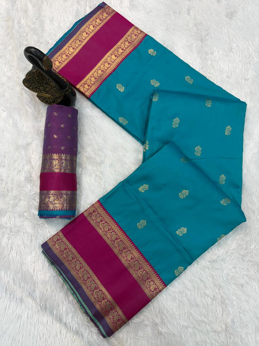 Fairytale Firozi Soft Banarasi Kathpadar Silk Saree With Elision Blouse Piece