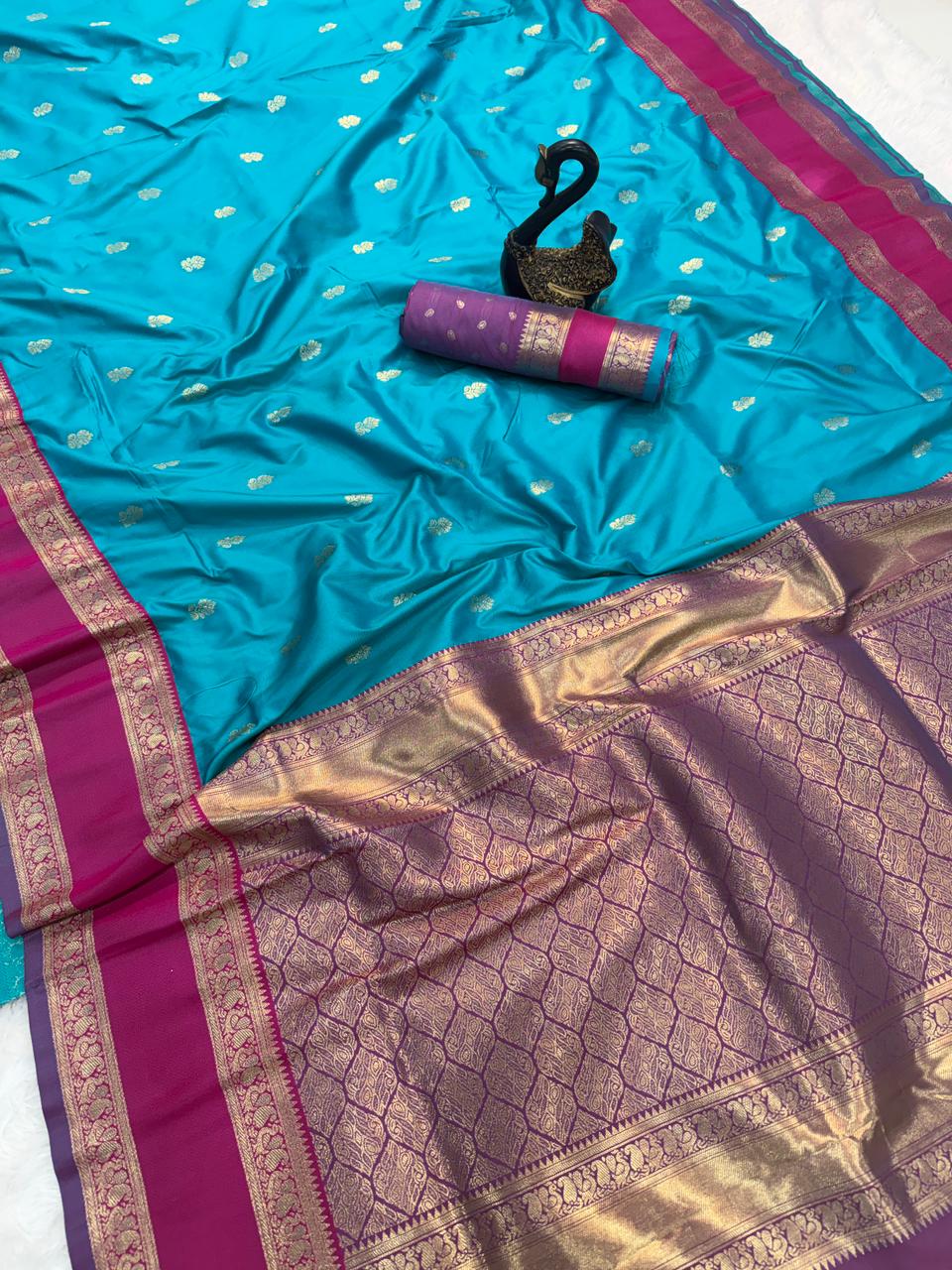 Fairytale Firozi Soft Banarasi Kathpadar Silk Saree With Elision Blouse Piece