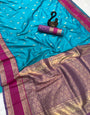 Fairytale Firozi Soft Banarasi Kathpadar Silk Saree With Elision Blouse Piece