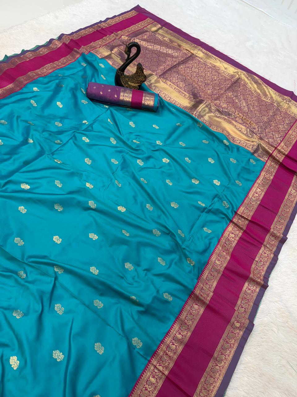 Fairytale Firozi Soft Banarasi Kathpadar Silk Saree With Elision Blouse Piece