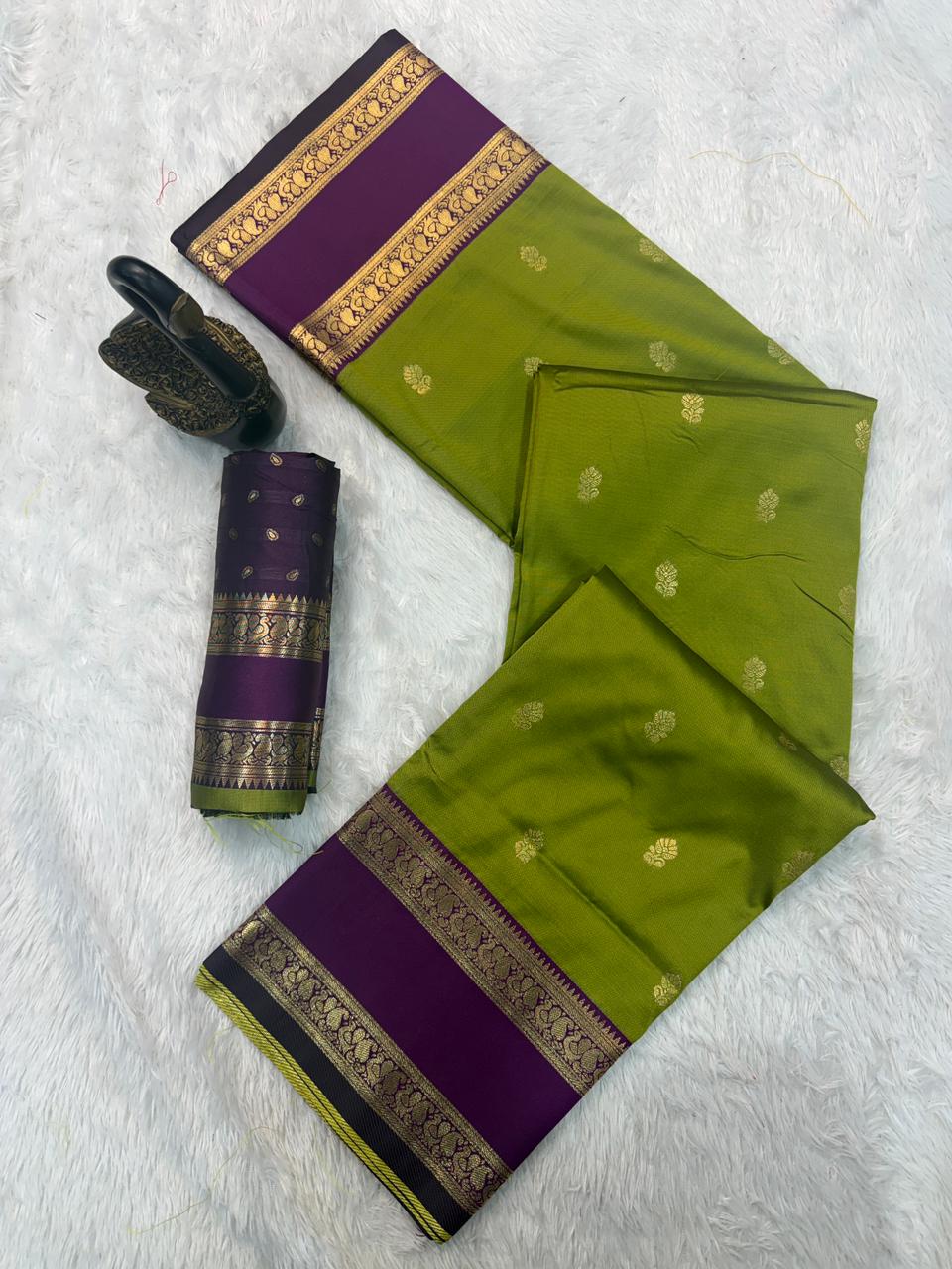 Vestigial Mehndi Soft Banarasi Kathpadar Silk Saree With Alluring Blouse Piece