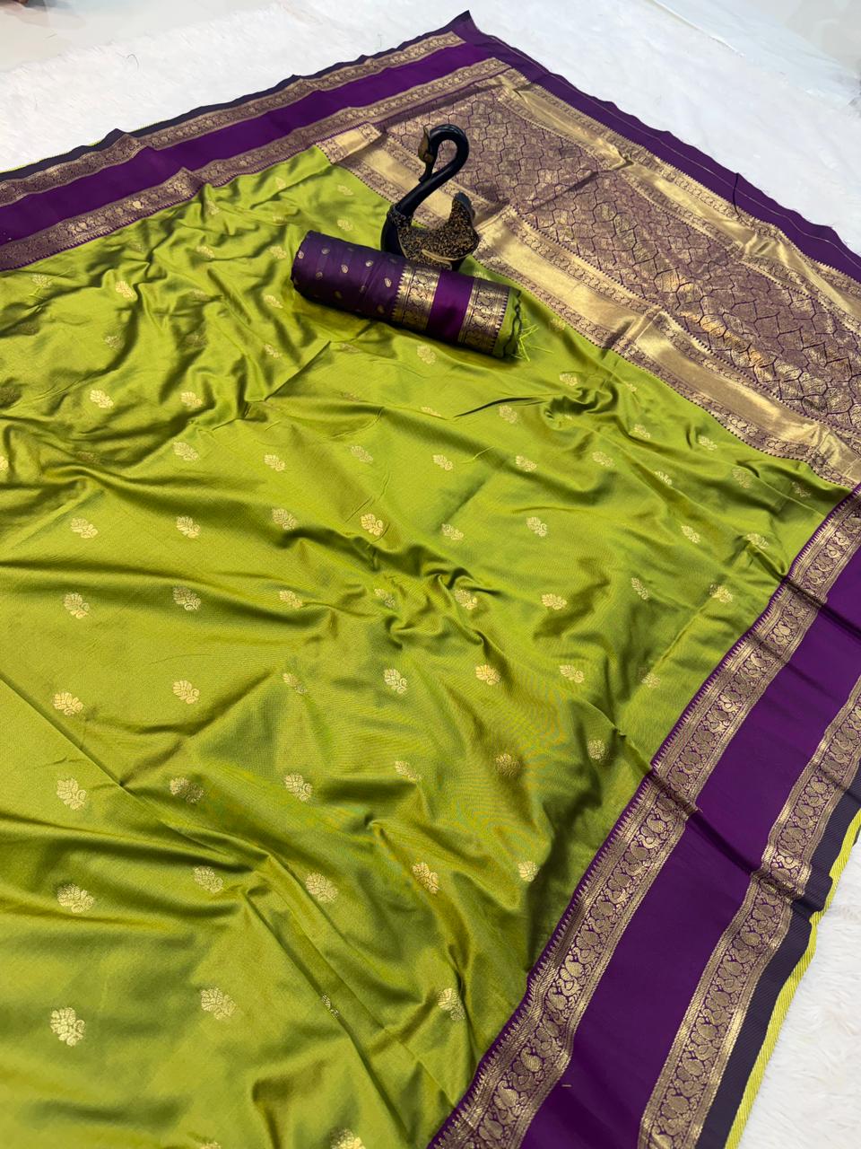 Vestigial Mehndi Soft Banarasi Kathpadar Silk Saree With Alluring Blouse Piece