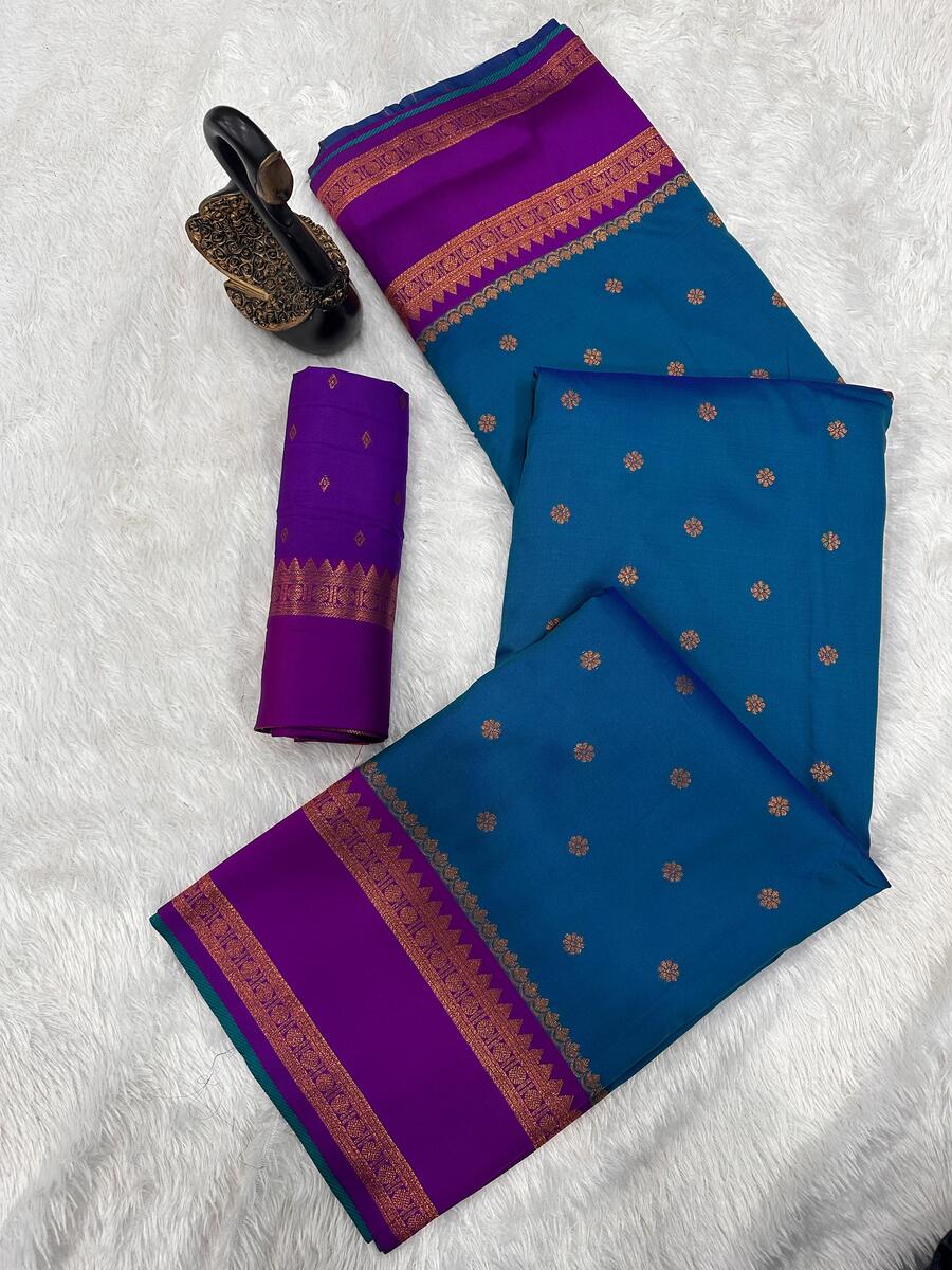 Efflorescence Teal Blue Soft Banarasi Silk Saree With Stunner Blouse Piece