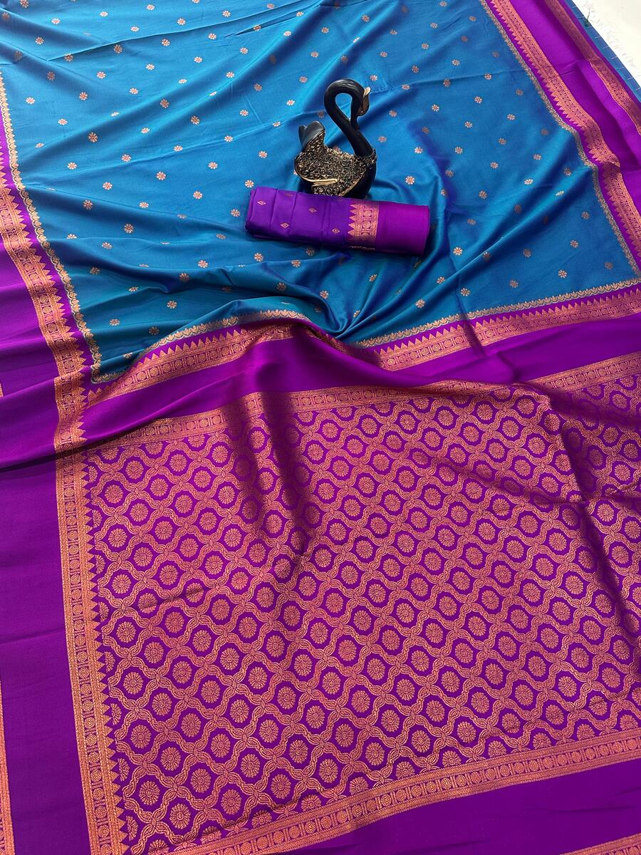 Efflorescence Teal Blue Soft Banarasi Silk Saree With Stunner Blouse Piece