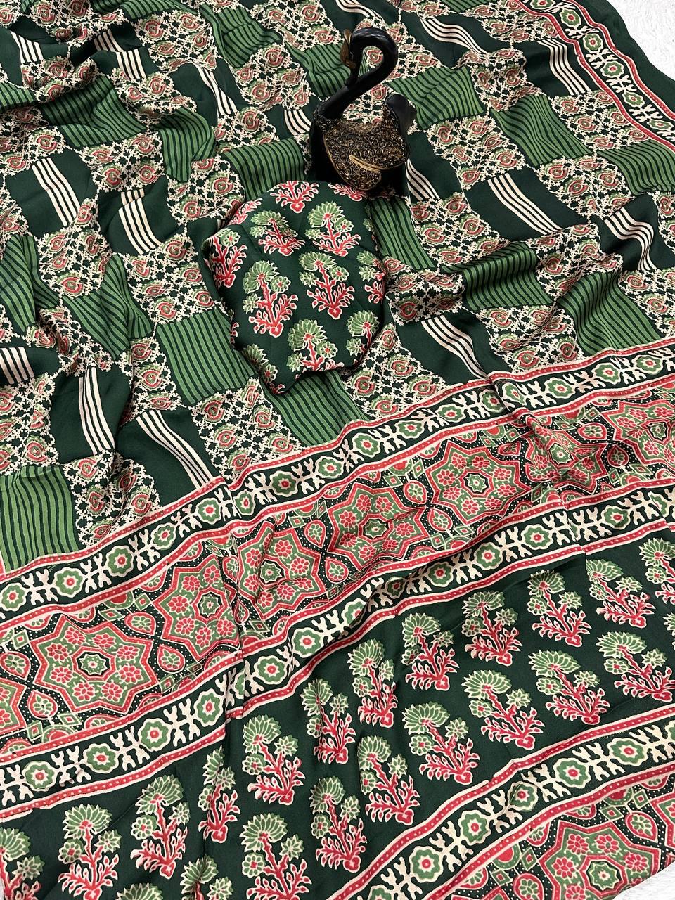 Engaging Dark Green Ajrakh Printed Gajji Soft Silk Saree With Glorious Blouse Piece