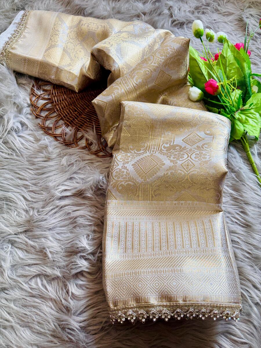 Classy Beige Soft Tissue Silk Saree With Mesmerising Blouse Piece
