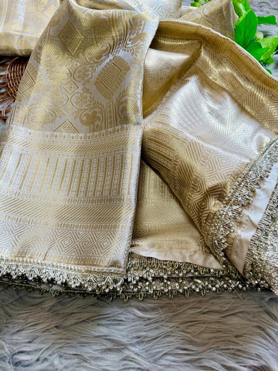 Classy Beige Soft Tissue Silk Saree With Mesmerising Blouse Piece