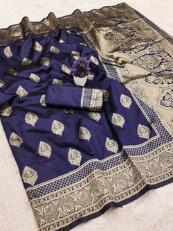 Ornate Navy Blue Soft Silk Saree With Surpassing Blouse Piece