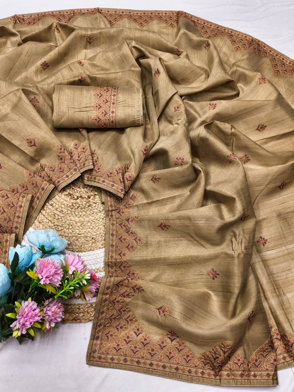 Appealing Beige Embroidery Work Tussar Silk Saree With Lustrous Blouse Piece