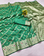 Prodigal Green Soft Banarasi Silk Saree With Jubilant Blouse Piece