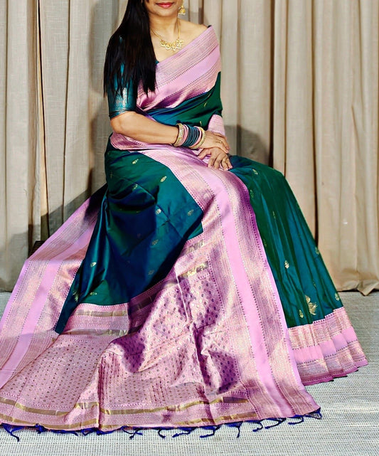 Enticing Dark Green Soft Banarasi Silk Saree With Marvellous Blouse Piece