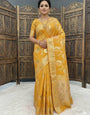 Enamoring Mustard Banarasi Dola Silk Saree With Seraglio Blouse Piece