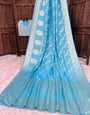 Classic Sky Banarasi Dola Silk Saree With Assemblage Blouse Piece