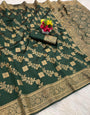 Fancifull Dark Green Soft Silk Saree With Rhapsodic Blouse Piece