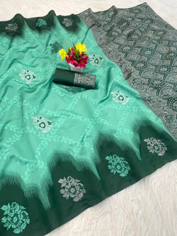Cynosure Sea Green Soft Silk Saree With Embellished Blouse Piece